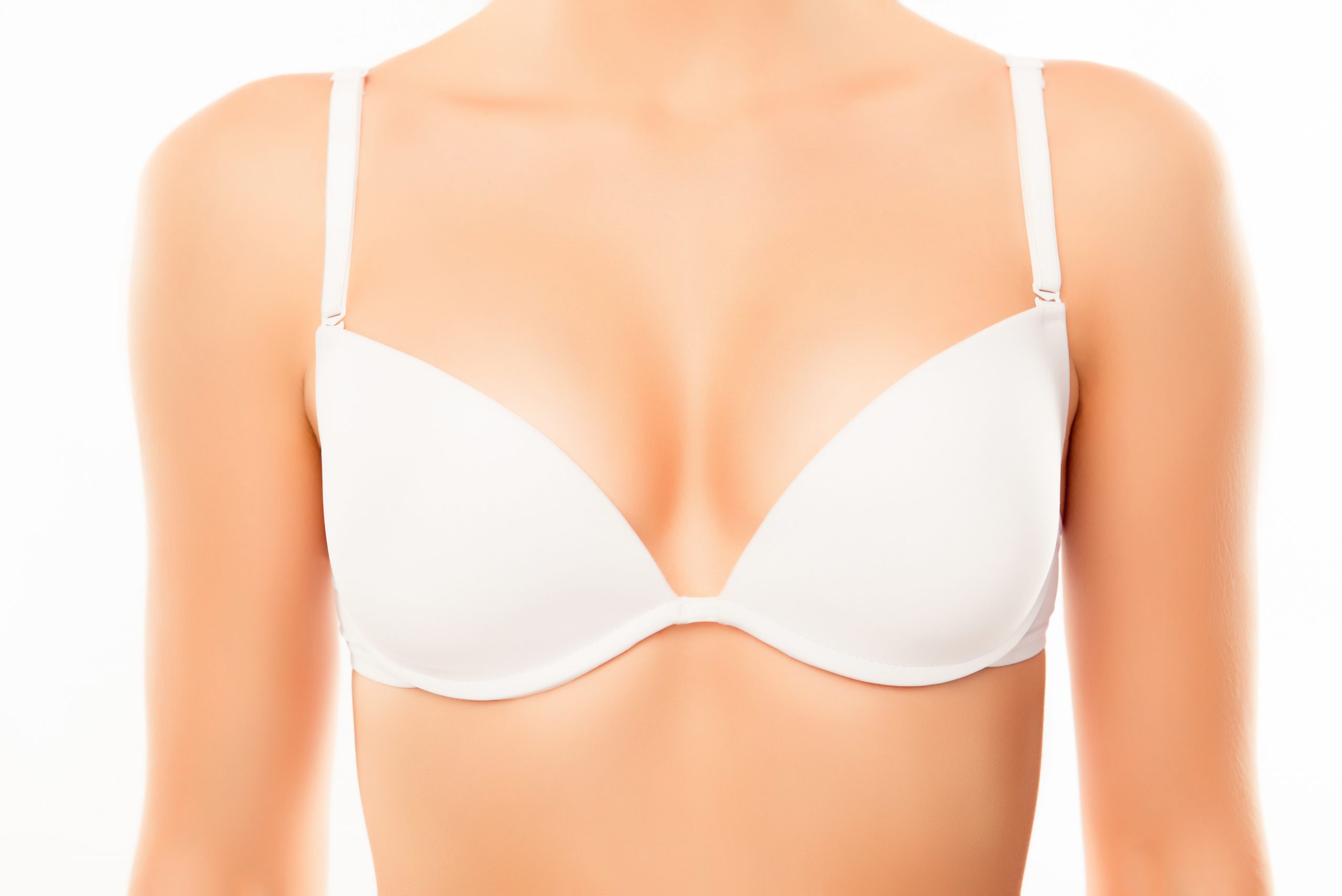 Close up of sexy woman with perfect chest in white bra - Criswell